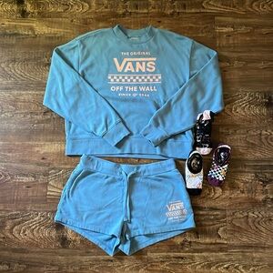 Vans fleece top, shorts and socks.
Size Small